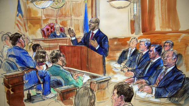 This courtroom sketch depicts Paul Manafort, seated right row second from right, together with his lawyers, the jury and the US District Court Judge TS Ellis.