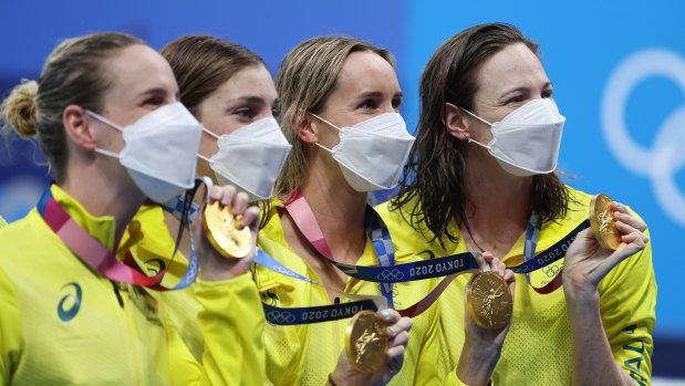 The victorious women’s 4x100m freestyle team with their gold medals on Sunday.
