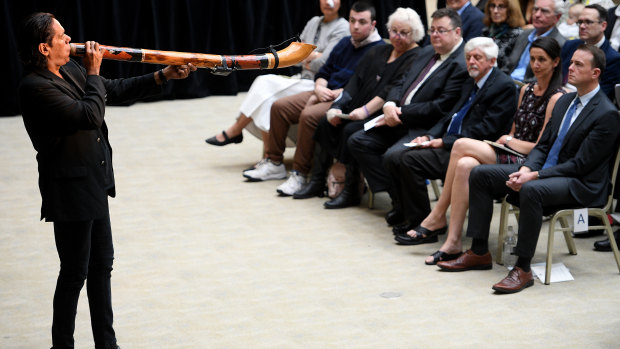 William Barton gives a didgeridoo performance at the State Memorial Service for Les Murray.