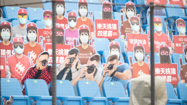 Cardboard cutouts of fans before prior to the baseball season opening game last year. It was played behind closed doors as Taiwan took strong early action against the pandemic. 