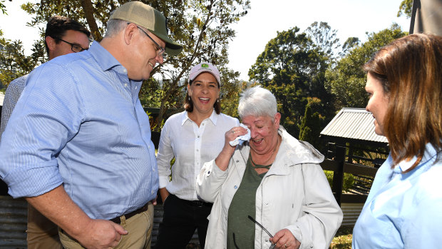 Australian Prime Minister Scott Morrison (left), wife Jenny (right) and Queensland LNP Leader Deb Frecklington meet with Pamela Skeen who had lost her home in bushfire-affected suburb of Binna Burra in the Gold Coast Hinterland.