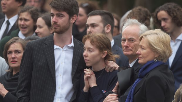 Greg Earl and children Nat and Eleanor among the mourners at Deborah Cameron's funeral.