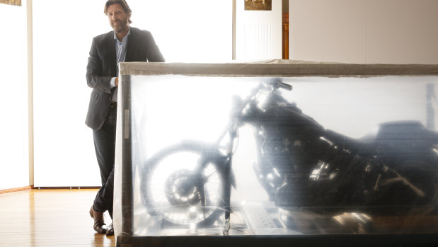 Under wraps: National Film and Sound Archive CEO Jan Müller with Heath Ledger's Harley-Davidson.