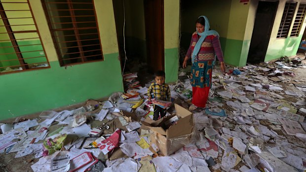 Books lie scattered at the Rajdhani Public School which was vandalised in Tuesday's violence at Shiv Vihar in New Delhi.