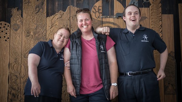 Ginninderry workmates Kathryn Rodwell and Peter Bartholomew with employment manager Emma Sckrabei (centre).