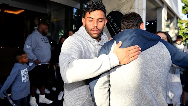 Players outside the Pullman hotel at Olympic Park, one of the venues expected to hold players in solitary confinement for 14 days.