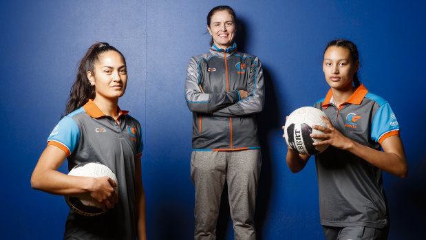 Giants players Ngawai Eyles and Nalani Makunde, with coach Sharyn Hill (middle).  