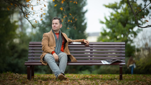 Dr Simon Sleight on the park bench dedicated to his wife's memory 