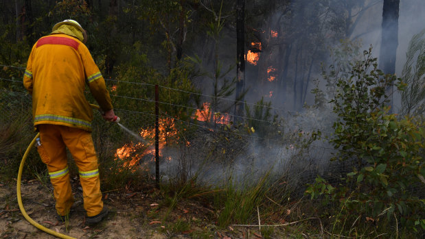RFS crews continued to contain the Gospers Mountain Fire north-west of Sydney on Tuesday.