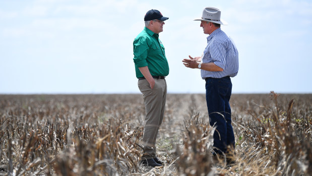 Prime Minister Scott Morrison with farmer David Gooding on his drought-affected property near Dalby, Queensland.