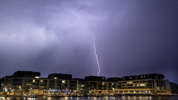 Lightning flashes over the Kingston Foreshore on Thursday night.