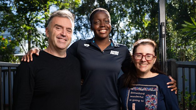 Commonwealth Games para-swimmer Vicky Belando Nicholson is photographed with her parents Ewan and Susana at their home in Brisbane. 