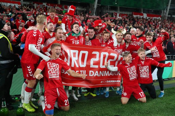 Danish players celebrate their qualification for Euro 2020.