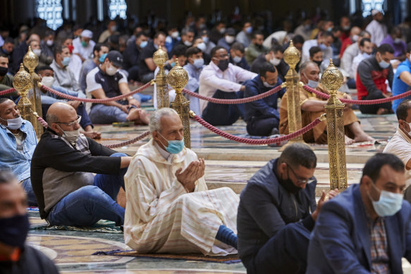 Moroccans wear face masks and pray respecting social distancing at the great Hassan II Mosque in Casablanca, Morocco. In Morocco today, around 10,000 mosques have opened their doors for Friday prayers, for the first time since the outbreak of coronavirus in March.