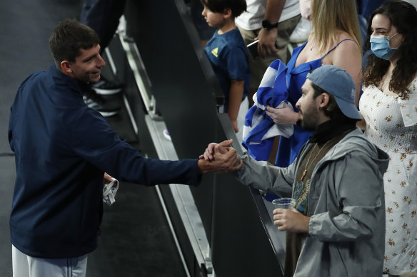 Michail Pervolarakis of Greece greets fans during day four of the 2021 ATP Cup on February 5 in Melbourne.