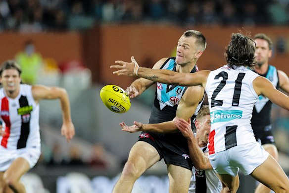 Robbie Gray avoids the Saints’ defence. 