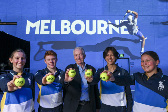 Craig Tiley, CEO of Tennis Australia, at the launch for the Australian Open 2025 with ball kids (L-R) Lucy, William, Daniel and Hannah.