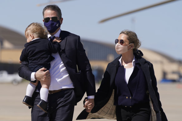 Hunter with his wife, Melissa Cohen, 
and their young son, Beau, in March. 