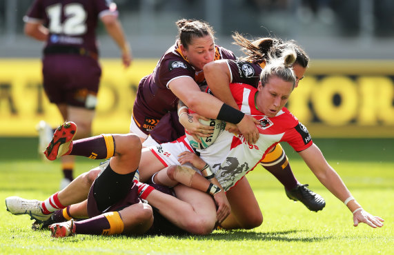Holli Wheeler is brought down during the Dragons' round one clash with the Broncos at Bankwest Stadium.
