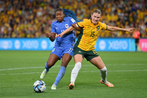 Australia’s Clare Hunt battles France’s Kadidiatou Diani for possession.