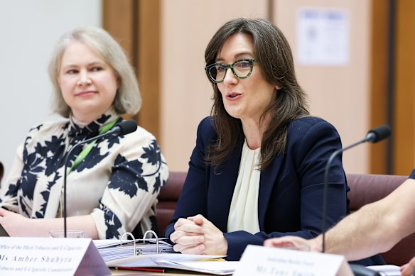 Illegal Tobacco and E-Cigarette Commissioner Amber Shuhyta (right) at a hearing in Canberra this month.  