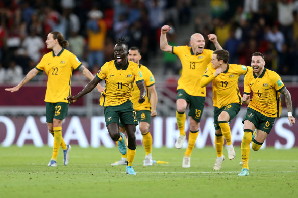 The Socceroos celebrate qualification to the 2022 World Cup