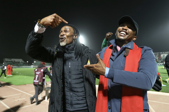 Samuel Eto’o, right, and Cameroon coach Rigobert Song celebrate after the controverisial win in the World Cup qualifying match against Algeria.