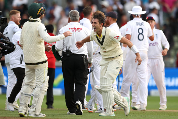 Pat Cummins and Nathan Lyon of Australia celebrate victory in the First Test in Edgbaston.