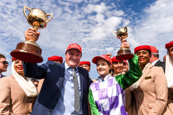 Darren Weir and Michelle Payne after Prince Of Penzance won the 2015 Melbourne Cup.