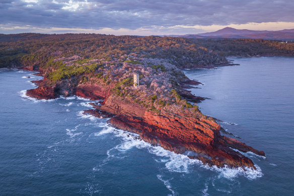 Sun rising over Boyd Tower in the Ben Boyd National Park, Eden.