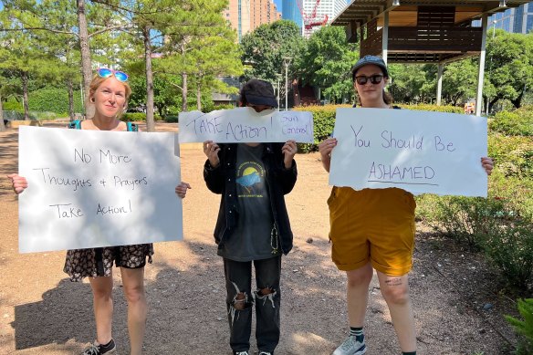 Anti-NRA protesters, including mother Leyna, on left, who fears for her children in public schools.