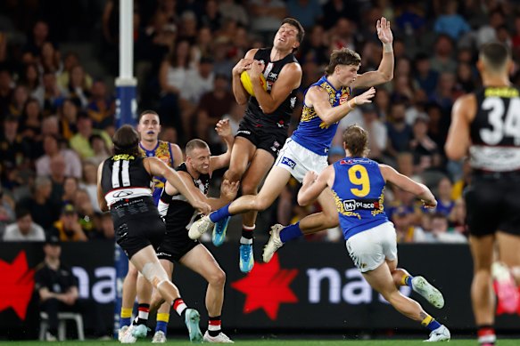 St Kilda’s Rowan Marshall flies high for a mark - a different mark at Marvel Stadium on Sunday.