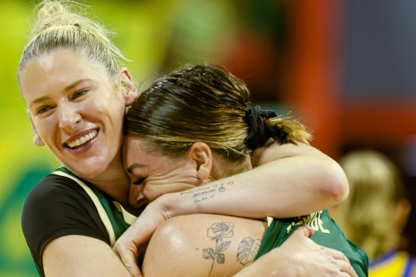 Lauren Jackson hugs Opals teammate Cayla George at the Olympics qualifying event in Brazil.