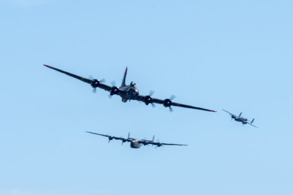 A Boeing B-17 Flying Fortress, front, is seen seconds before colliding with a Bell P-63 Kingcobra in Dallas.