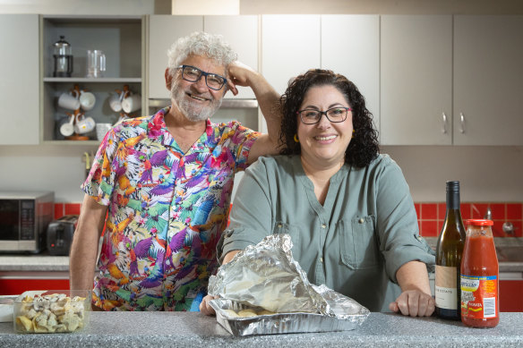 Amy Revell and her dad John Georgiou, whom she pays to organise weekly meals for her family.