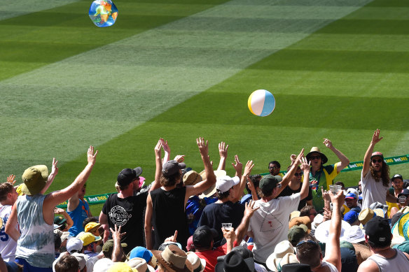 Having a ball … even two beach balls. An attempt at fun during an Ashes Test at the MCG. 