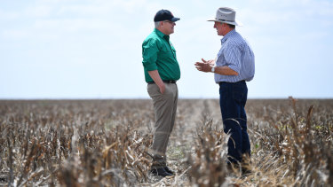 Prime Minister Scott Morrison with farmer David Gooding on his drought-affected property near Dalby, Queensland.