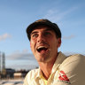 Pat Cummins poses with a replica Ashes urn after the final Test at the Oval.