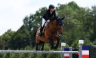 Five-time Olympic showjumper Edwina Tops-Alexander in the heats of the team jumping event at Versailles.