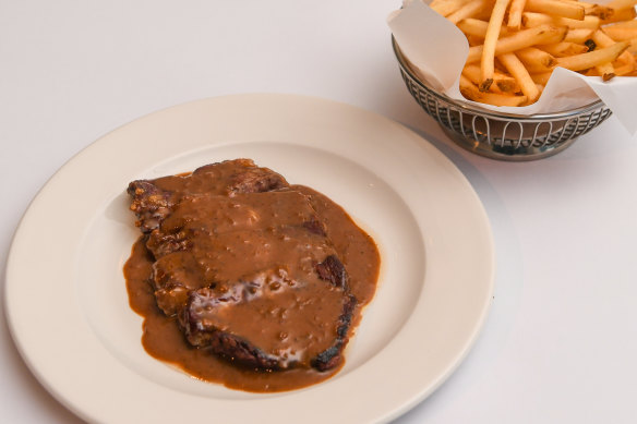 Scotch fillet with a classic peppercorn sauce and fries.