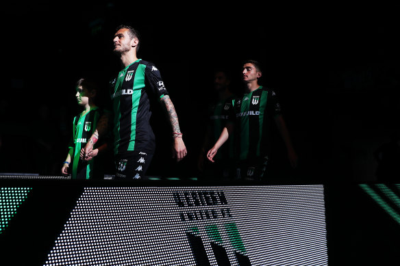 Western United players walk on to stage during the A-League 2019-20 season launch.