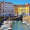 Livorno’s coloured houses and new fort sit on its canals.