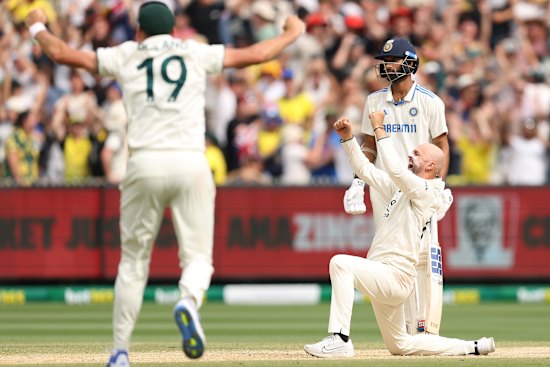 Victory: Nathan Lyon gets Mohammed Siraj lbw.