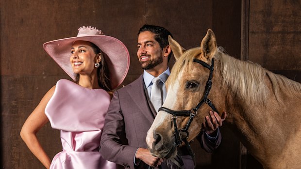 Laura Dundovic in Mariam Seddiq and Stacey Herrera millinery, Duncan James in MJ Bale and Tash at Royal Randwick.