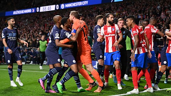 Tempers flared in the other semi-final between Manchester City at Atletico Madrid.