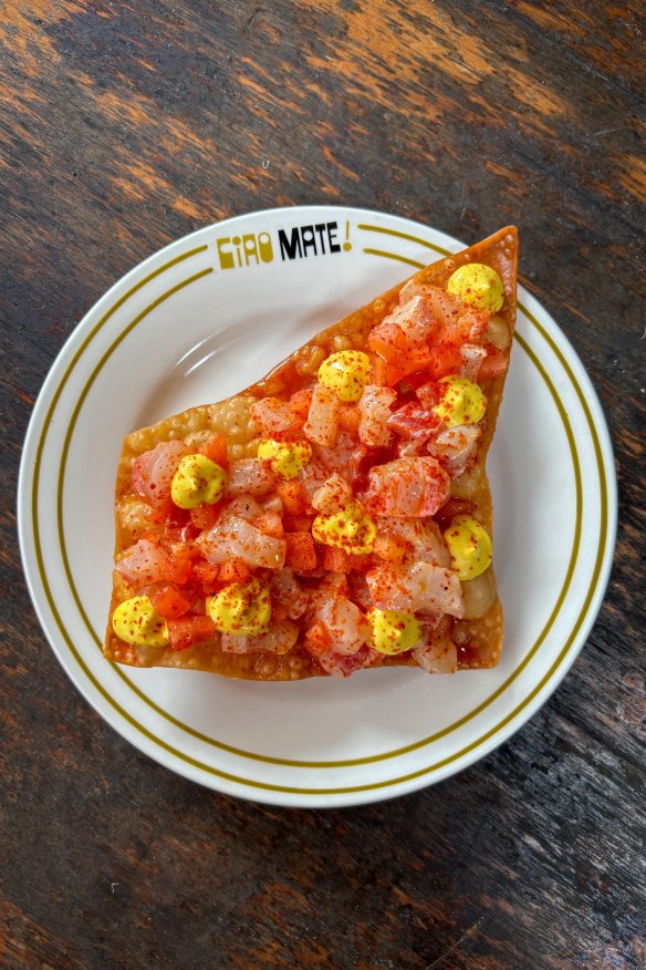 Crostoli with mahi mahi, tomato and fermented chilli.