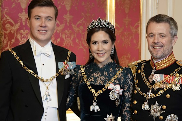 King Frederik and Queen Mary with their son and heir Crown Prince Christian on the New Year's gala, January 1 2025 at Amalienborg in Copenhagen.
