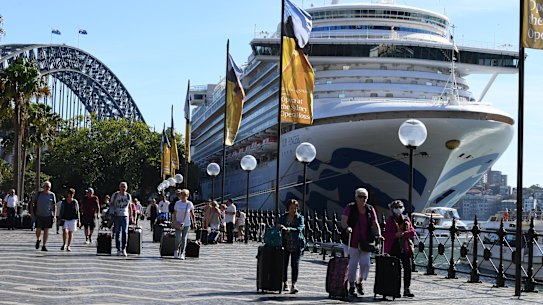 Passengers leave the Ruby Princess at Circular Quay in Sydney on Thursday March 20.