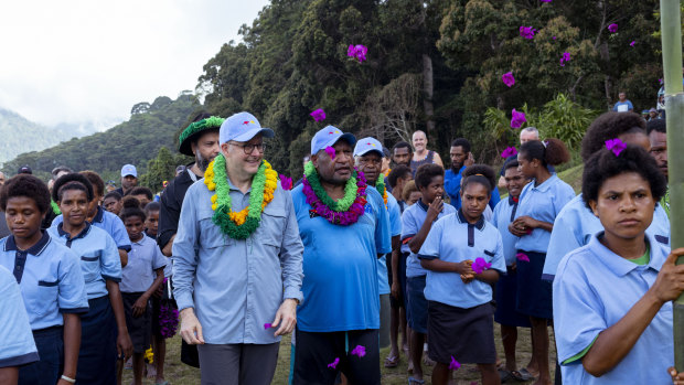 Anzac cakewalk: Albo gets a sweet treat in PNG while Duttons stokes home front