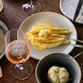 Carbonara poached egg with white asparagus.